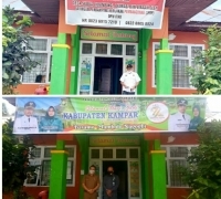 Kades Sibuak Ganti Spanduk Lembaga Sosial Dengan HUT Kampar Ke-71 Tahun