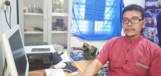 Ketua Dewan Pimpinan Cabang (DPC) Persatuan Jurnalistik (PJI) Kabupaten Pelalawan, Provinsi Riau, Dien Puga