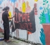 Mural For Justice : Menggambar Pesan Solidaritas dan Tuntutan Keadilan di Tembok Perlawanan Rumah Gerakan Rakyat WALHI Riau 