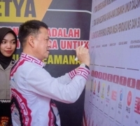 Pj Bupati Kampar Tandatangani Deklarasi Pemilu Damai Berlalu Lintas